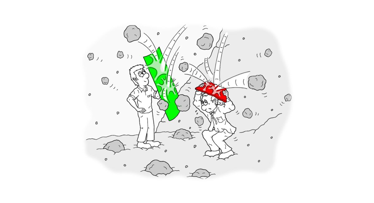person holding a green shield to protect himself from stones while other person with red shield struggles to shield himself.